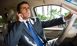 Man talking on a cell phone while driving