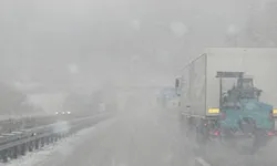 Snowy dangerous highway with courier driver
